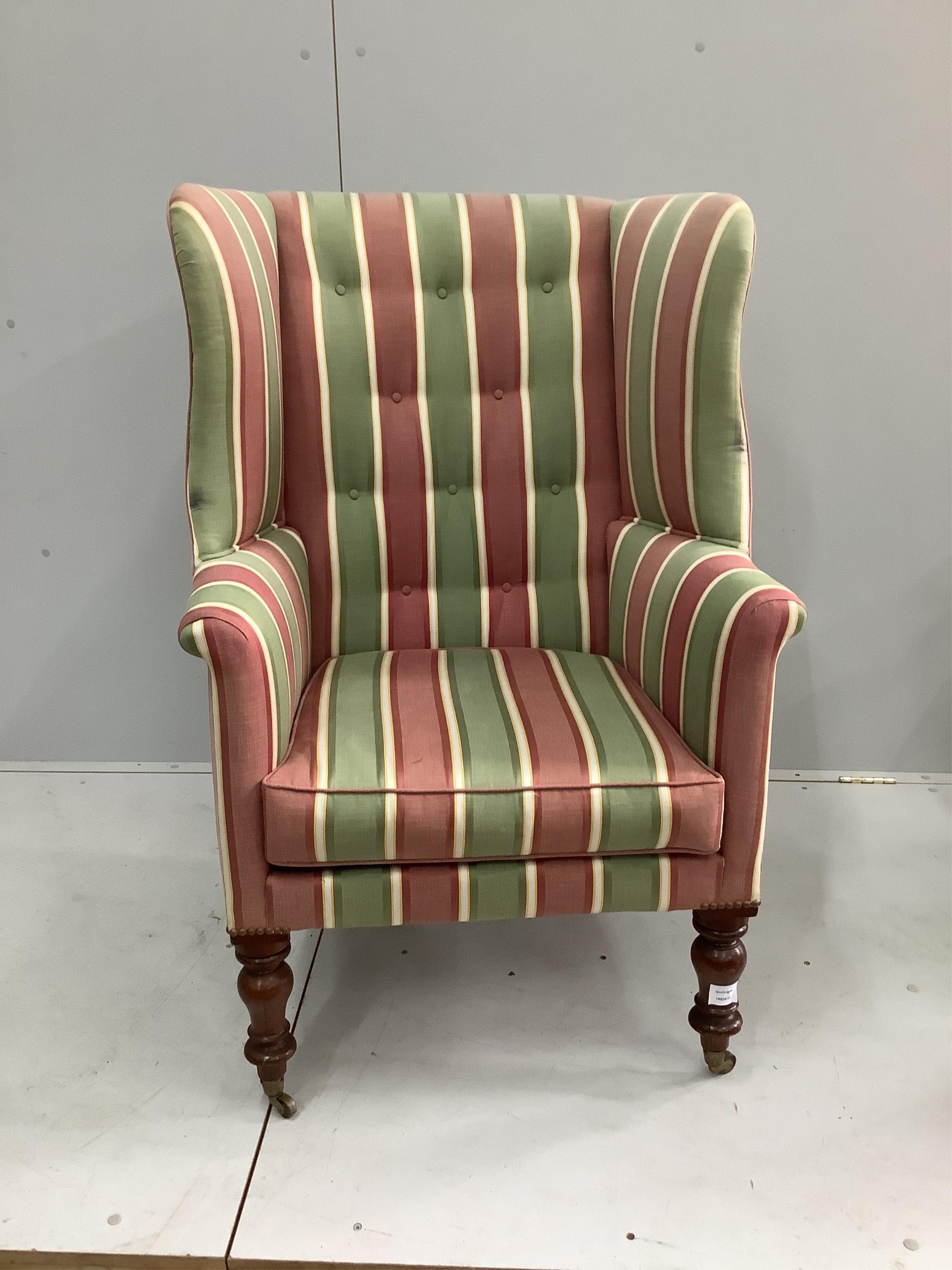 A Victorian mahogany tub framed buttoned wingback armchair, width 73cm, depth 60cm, height 110cm. Condition - fair